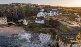 Aerial view of Ballintoy Harbour near Giants Causeway, County. Antrim, Northern Ireland, UK