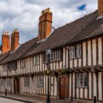 Timbered Tudor Buildings and a church tower in Stratford Upon Avon