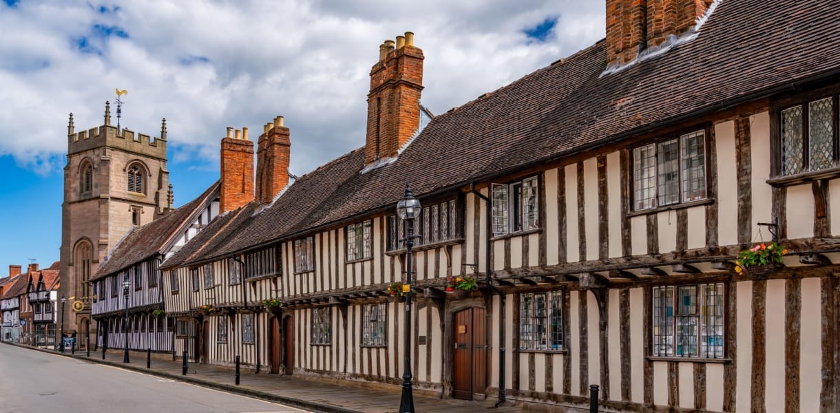 Timbered Tudor Buildings and a church tower in Stratford Upon Avon