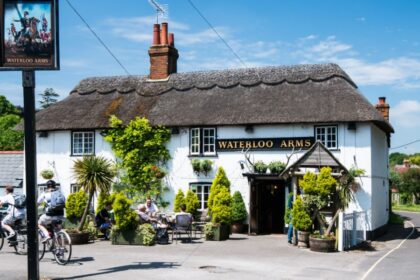 A traditional thatched pub called the Waterloo Arms in Lyndhurst in the New Forest, England