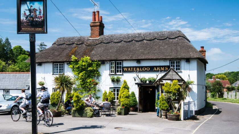 A traditional thatched pub called the Waterloo Arms in Lyndhurst in the New Forest, England