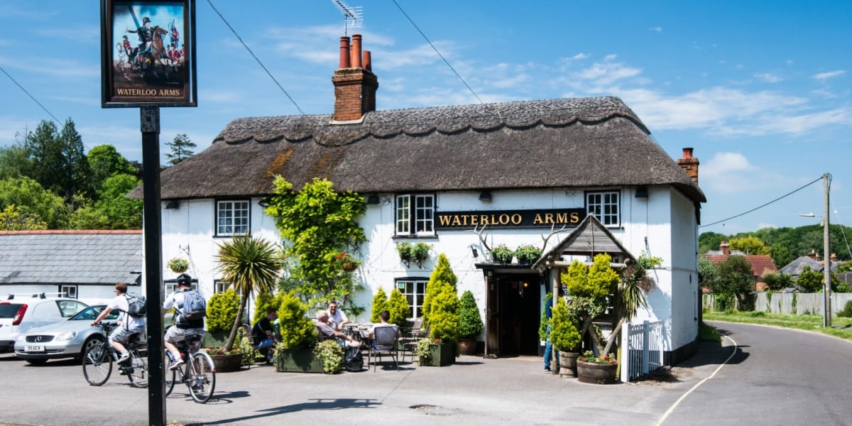 A traditional thatched pub called the Waterloo Arms in Lyndhurst in the New Forest, England