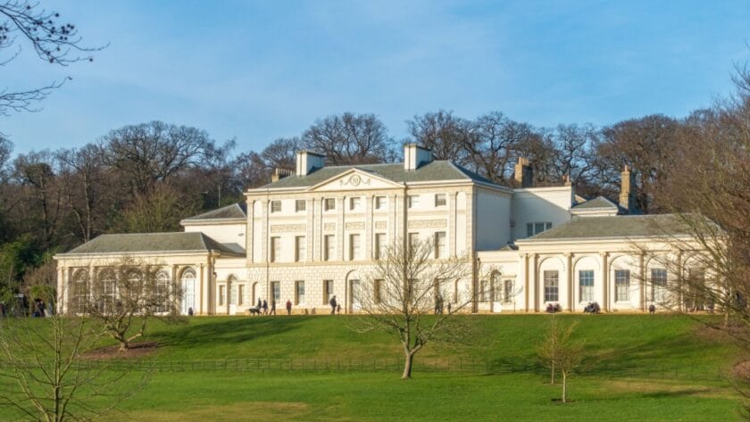 Kenwood House, a grand 18th-century stately home with white neoclassical façade, set in green parkland on Hampstead Heath in London