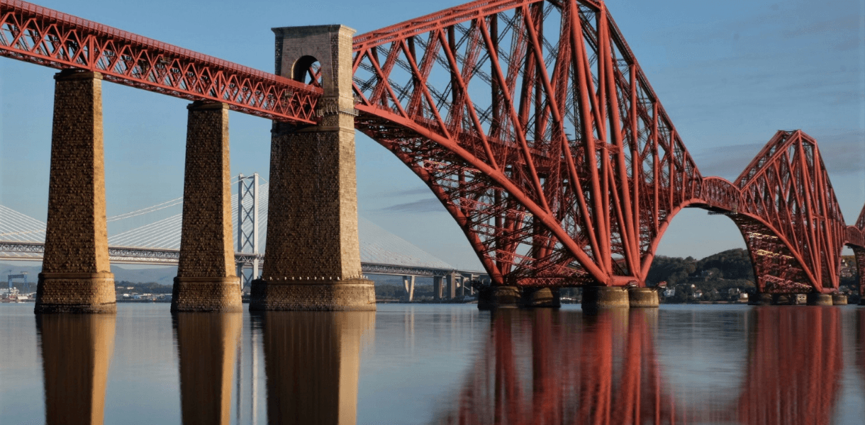 The red steel Forth Bridge crossing the Firth of Forth, one of Scotland’s great industrial engineering landmarks.